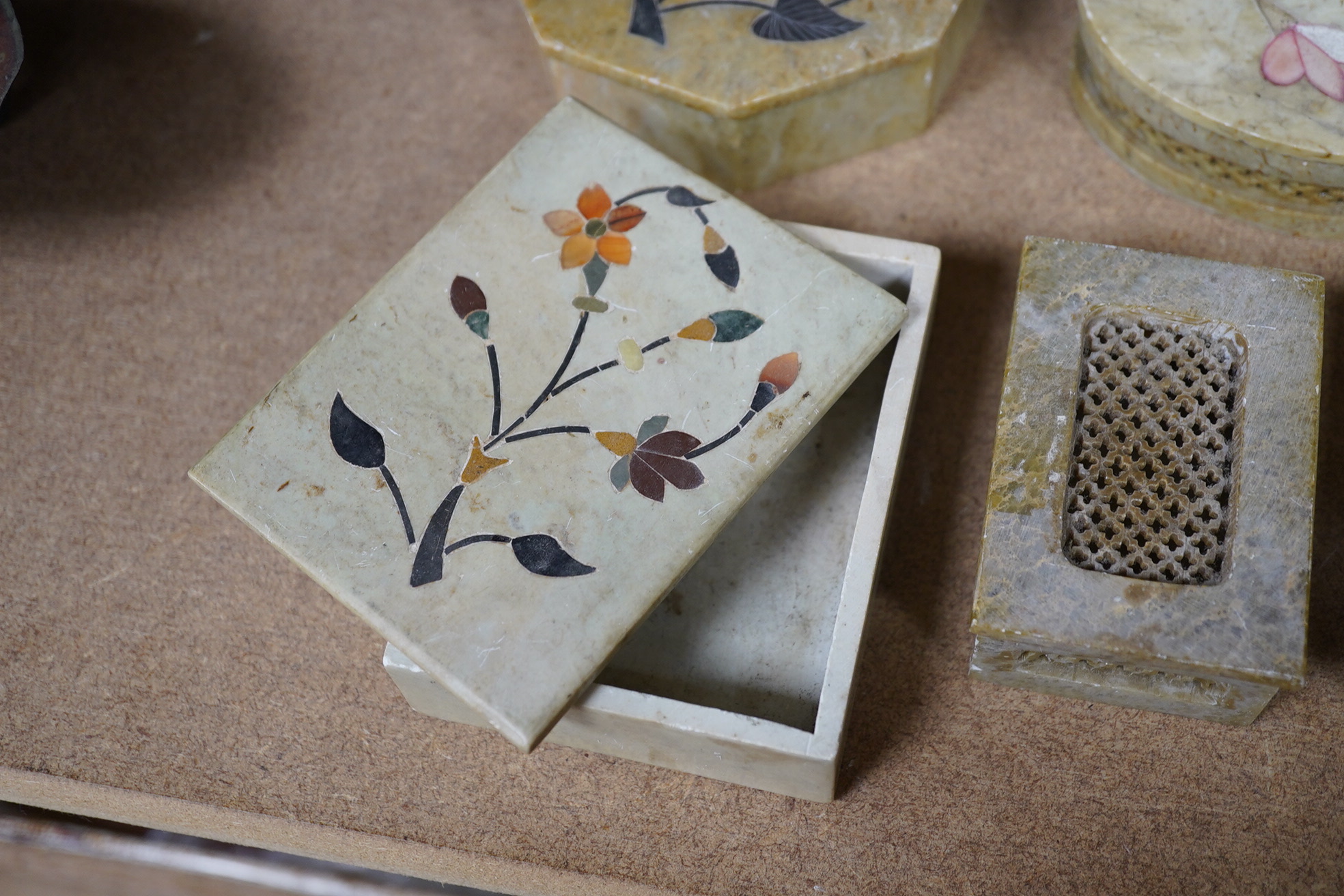 A group of assorted Indian soap stone pietra dura floral inlaid boxes, largest 10.5cm wide. Condition - good